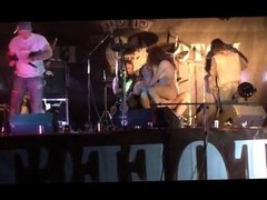 Girls strips naked and has tits groped on stage