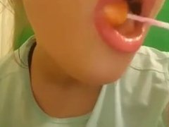 Girl sucking a lollipop sexy lips