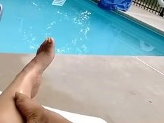 Her feet at the pool