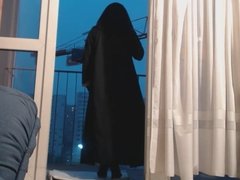 exhibe en niqab et collant noir