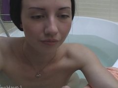 Cute teen plays with herself while showering