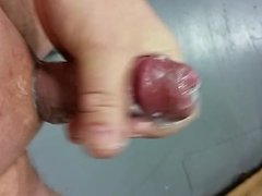 Handjob with plug in and with cum at work