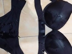 Pissing over sexy black panty and bra combo