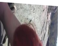 Red hair painted girl sucks dick outdoors and swallows