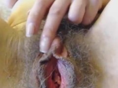 HAIRY SLUT SHOWS BIG MEAT HOLES ON CAM