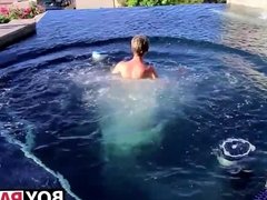Blonde twink Tyler Thayer jerking his cock near the pool
