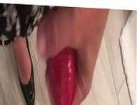 Masturbating in a condom and  heels and a dress