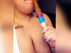 Sexy BBW latina sucking on a popsicle.