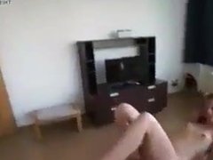 2 girls pissing in the living room