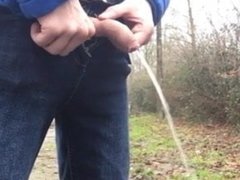 Thick uncut cock pissing in the woods