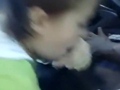 Sucking a black dick in a car at the mall
