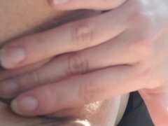 Teen fingers pussy in car