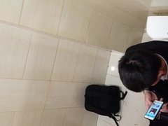 Asian guy looks porn on toilet jerks his cock and squirt 3