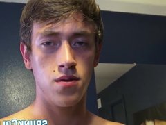 Good looking college twink rubs his big dick and cums solo