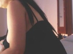 Latina shakes her tits and her ass