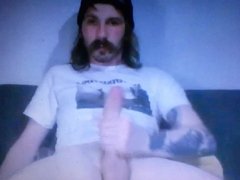 Longhaired moustached tattooed straight guy jerking long dic