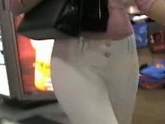 bubble butt girl in white tight trouser