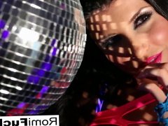 Romi plays with a disco ball before stuffing toying her