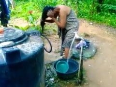 Sri Lankan Girl Bath In Outside