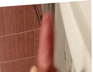 Jerking in bathroom