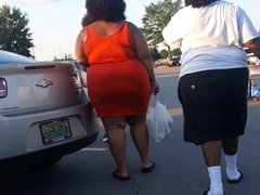 Delicious big booty bbw tight orange skirt.