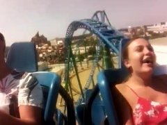 Blonde babe's great breasts get exposed on a roller coaster