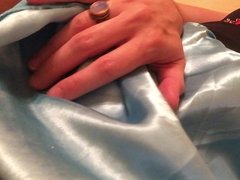 Teasing my clit and getting my satin panties all wet.