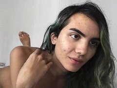 Hairy trans girl strokes cock on bed