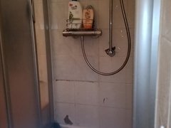 Shower ,  open Doors in Bathroom