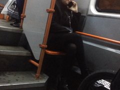 Hot MILF in black pantyhose in late tram