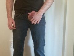 Teasing my cock and balls in jeans